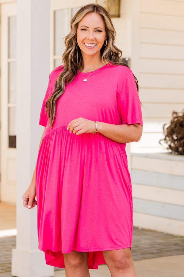 Plus Size fuchsia short sleeve babydoll dress with a round neckline and high-low hemline.
