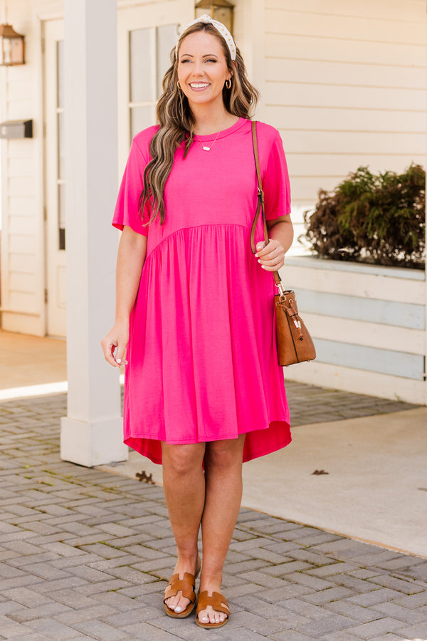 Plus Size fuchsia short sleeve babydoll dress with a round neckline and high-low hemline.