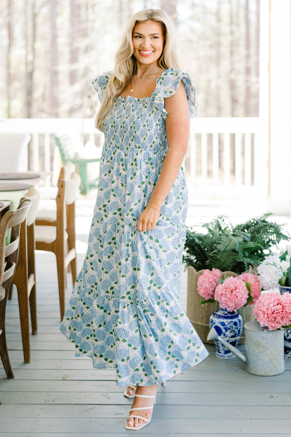 Chic Soul plus size clothing, ruffled-strap blue ruffled maxi dress with a smocked bodice and a blue hydrangea floral pattern  