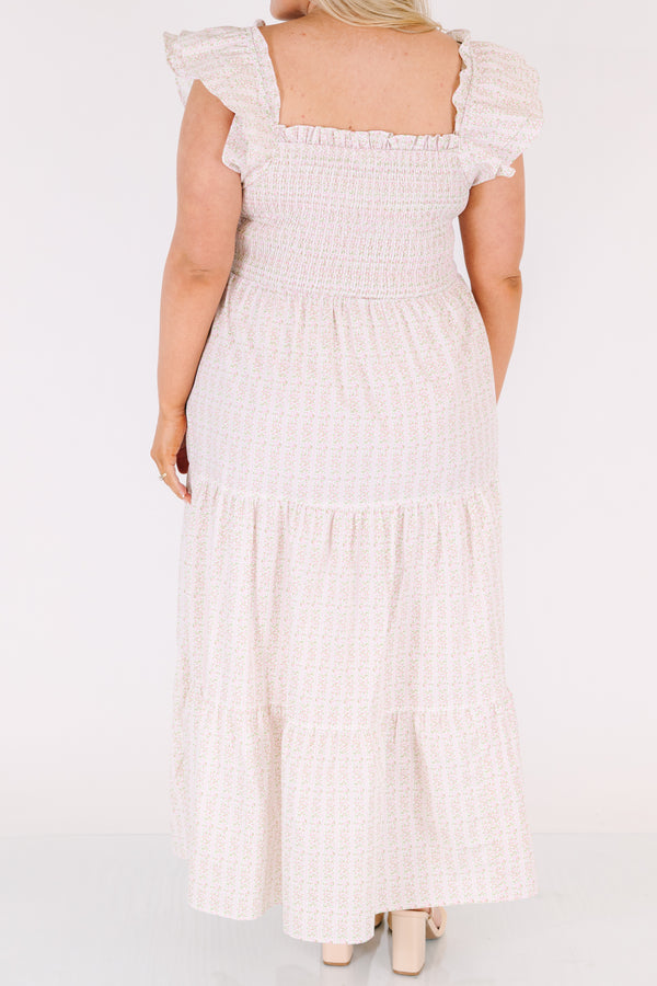 Chic Soul plus size clothing, pink maxi tiered maxi dress with a smocked texture on the bust a square neckline and flutter sleeves as well as a small floral pattern throughout 