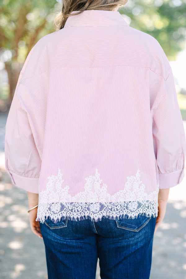 Plus Size rust stripe button-down top with long puff sleeves and a white lace hem.