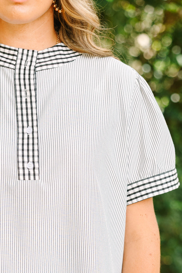 Plus size gray striped top with a flowy fit, gingham trim collar, and button-down neckline.