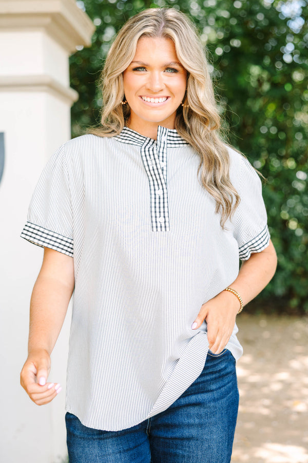 Plus size gray striped top with a flowy fit, gingham trim collar, and button-down neckline.