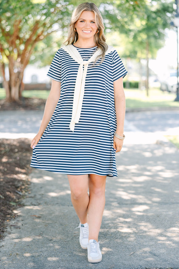 Plus Size navy and white horizontal striped t-shirt dress with a cream faux shawl detail.