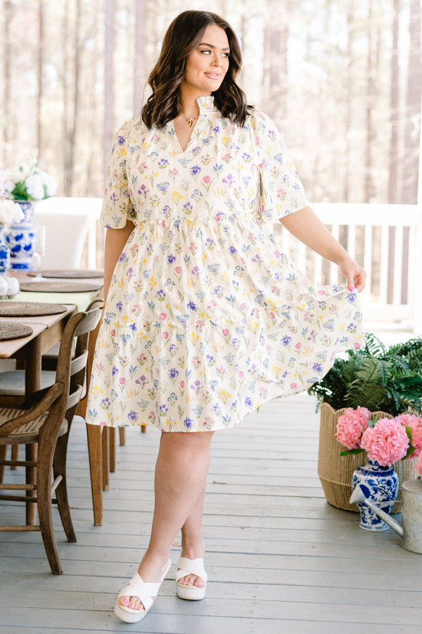 Chic Soul plus size clothing, short-sleeve white ruffled baby doll dress with a split-v-neckline and a multi-colored floral pattern
