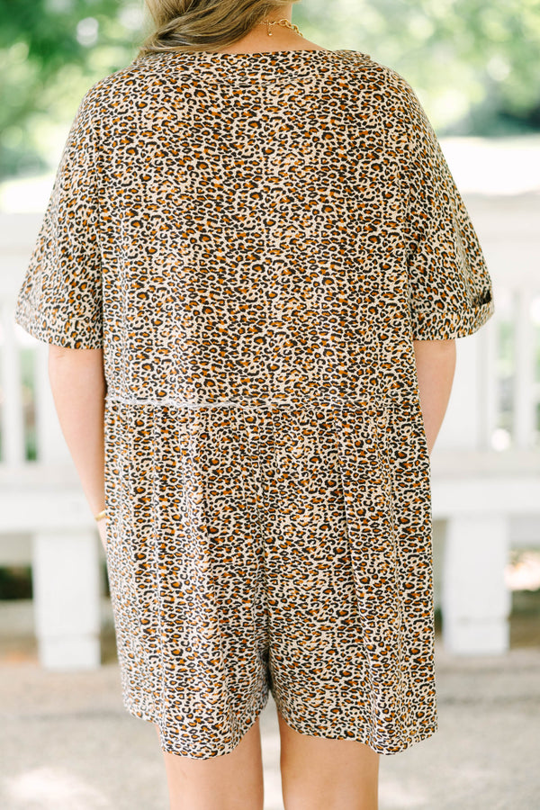 Plus Size brown leopard print romper with short sleeves, a V-neckline, and front button details.