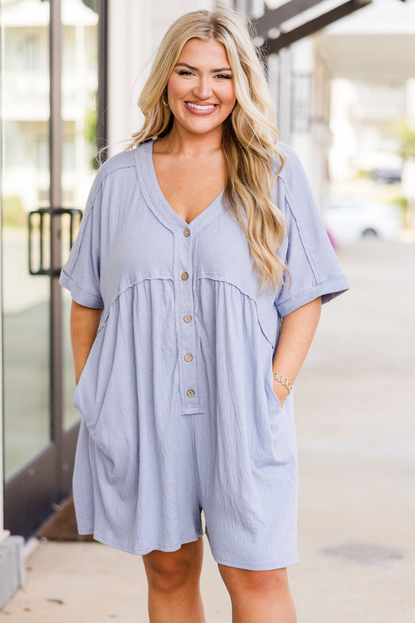 Chic Soul plus size clothing, short-sleeve dusty blue romper with  v-neckline and light brown button detailing with distressed stitching and side-pockets 