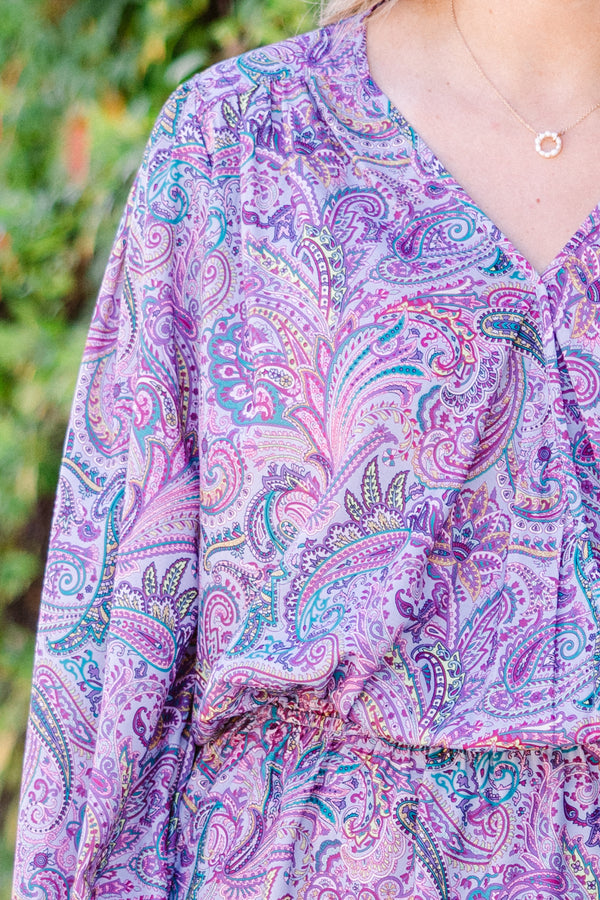 Chic Soul plus size clothing, long-sleeve purple baby doll smocked top with v-neckline and blue and purple paisley pattern with smocked detailing on wrists