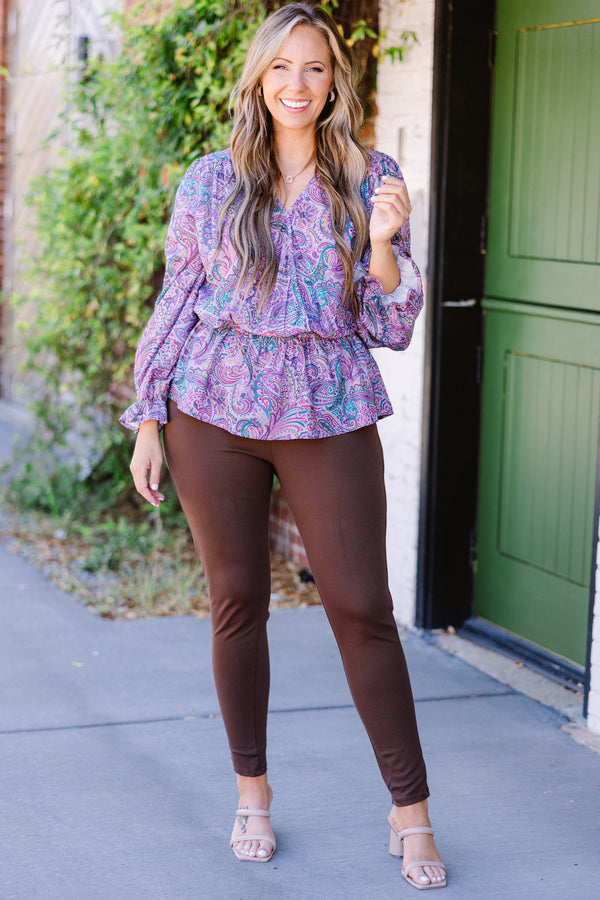Chic Soul plus size clothing, long-sleeve purple baby doll smocked top with v-neckline and blue and purple paisley pattern with smocked detailing on wrists