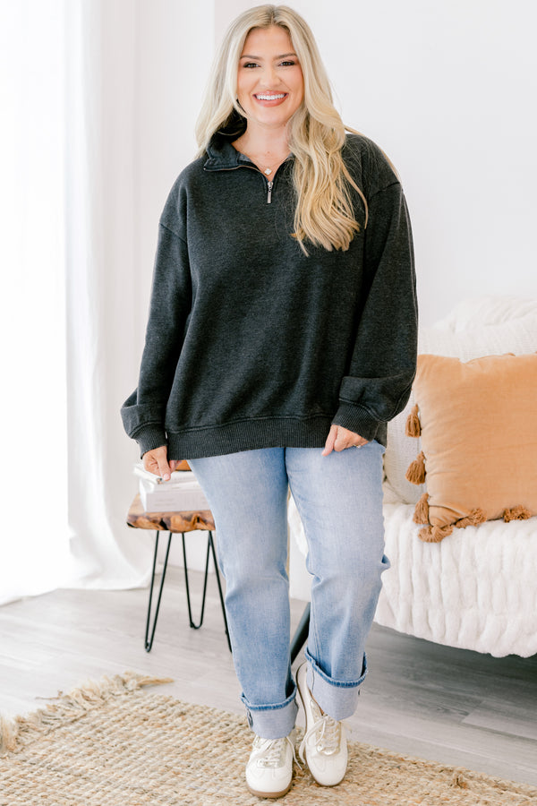 Chic Soul plus size clothing, black long sleeve pullover with a zipper that goes down to the top of the chest as well as a collar 