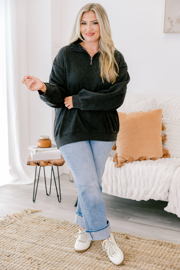 Chic Soul plus size clothing, black long sleeve pullover with a zipper that goes down to the top of the chest as well as a collar 
