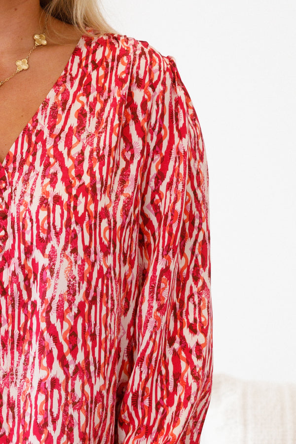 Chic Soul plus size clothing, fuchsia and white abstract stripe patterned long-balloon sleeve shallow v-neck top