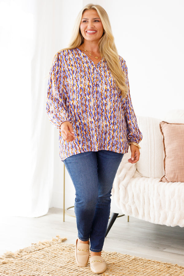 Chic Soul Plus size clothing, multi-color long sleeve top with an abstract pattern and slight v-neckline
