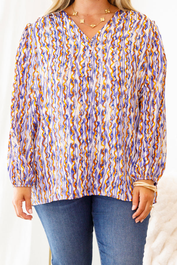 Chic Soul Plus size clothing, multi-color long sleeve top with an abstract pattern and slight v-neckline
