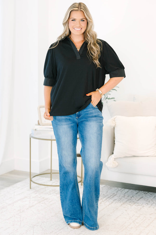 Plus Size black collared top with a v-neckline and puffed half-sleeves with cuffed finishes.