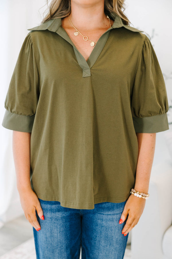 Plus Size olive green short puff sleeve top with a collared v-neckline 