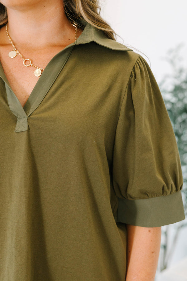 Plus Size olive green short puff sleeve top with a collared v-neckline 