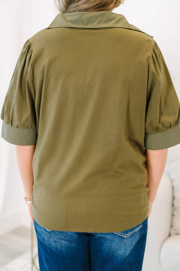 Plus Size olive green short puff sleeve top with a collared v-neckline 