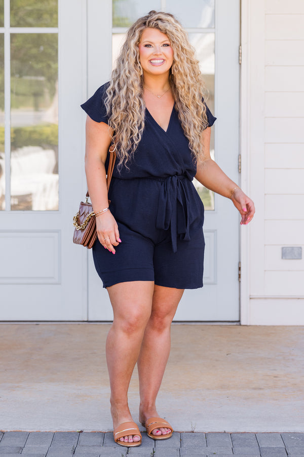 Chic Soul plus size clothing, short-sleeve flutter sleeve navy romper with waist-tie and v-neckline 