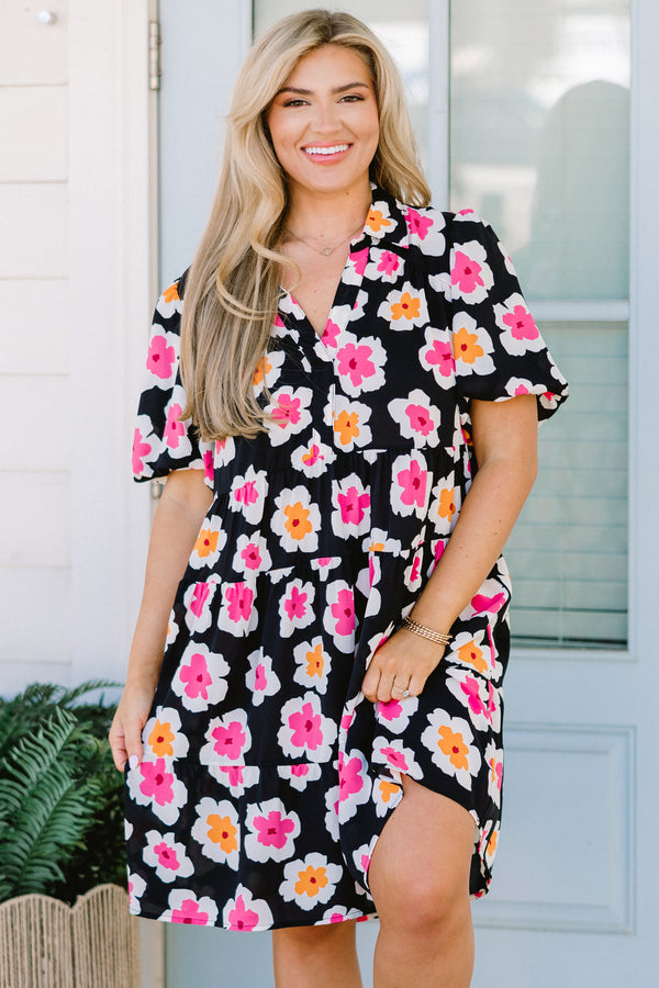 Chic Soul plus size clothing, black short sleeve tiered mini dress with v neckline and puff sleeves with large orange and pink floral pattern