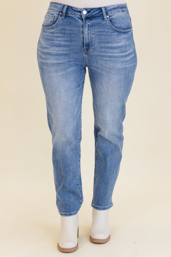 mid-waisted medium-wash straight-leg cropped denim jeans with silver button detailing 
