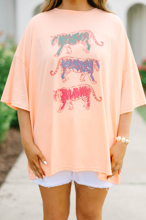 Plus Size neon coral oversized boyfriend tee with three colorful graphic tigers and white shorts.