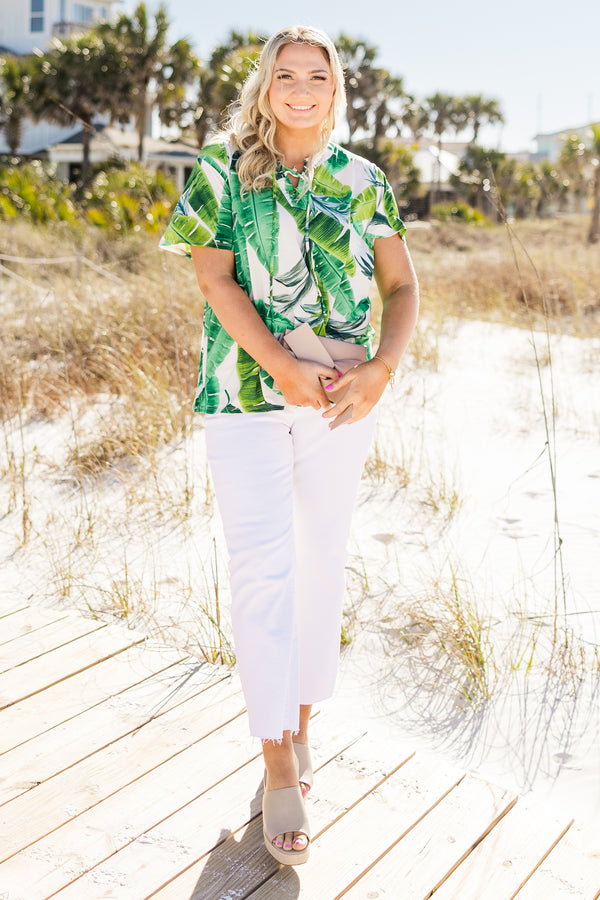 Chic Soul plus size clothing, Short sleeve white casual top with a leaf pattern and s light v-neck with a draw-string detail
