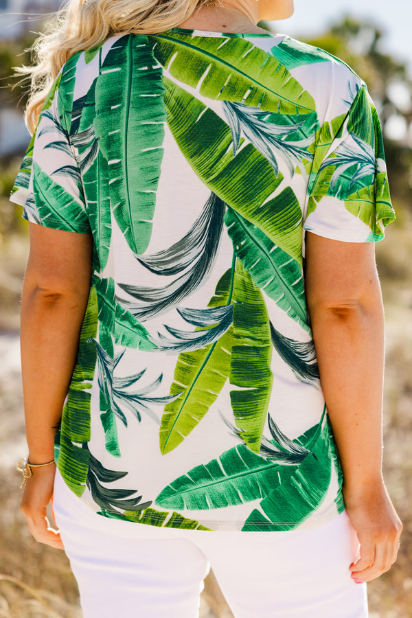Chic Soul plus size clothing, Short sleeve white casual top with a leaf pattern and s light v-neck with a draw-string detail
