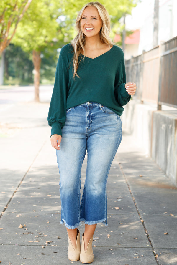 Chic Soul plus size clothing, medium wash denim capris with flare and frayed hemline