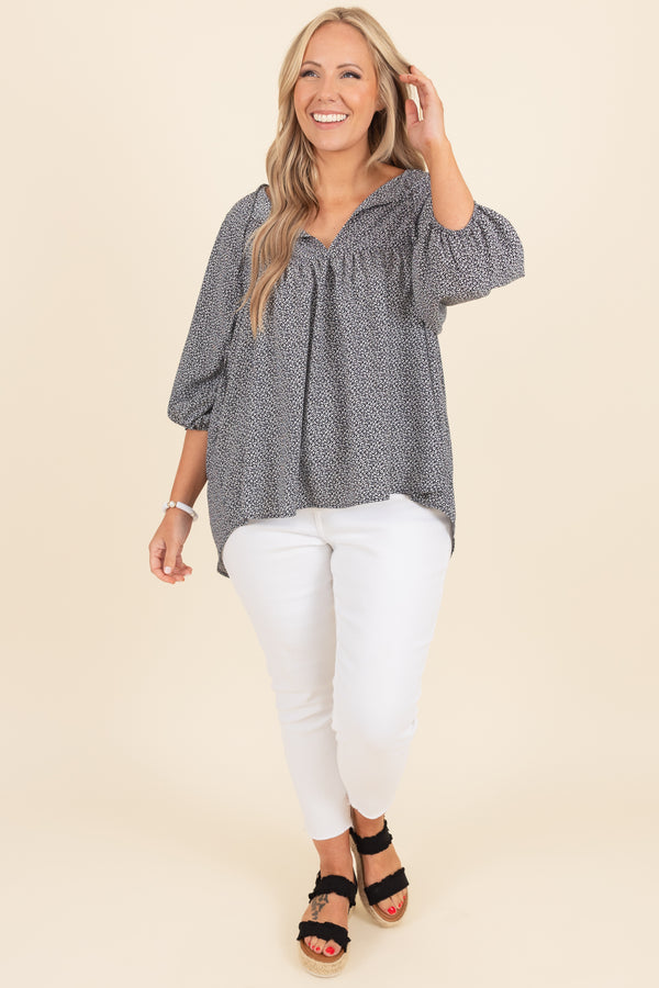 Chic Soul plus size clothing, black top with white pattern and bubble sleeves