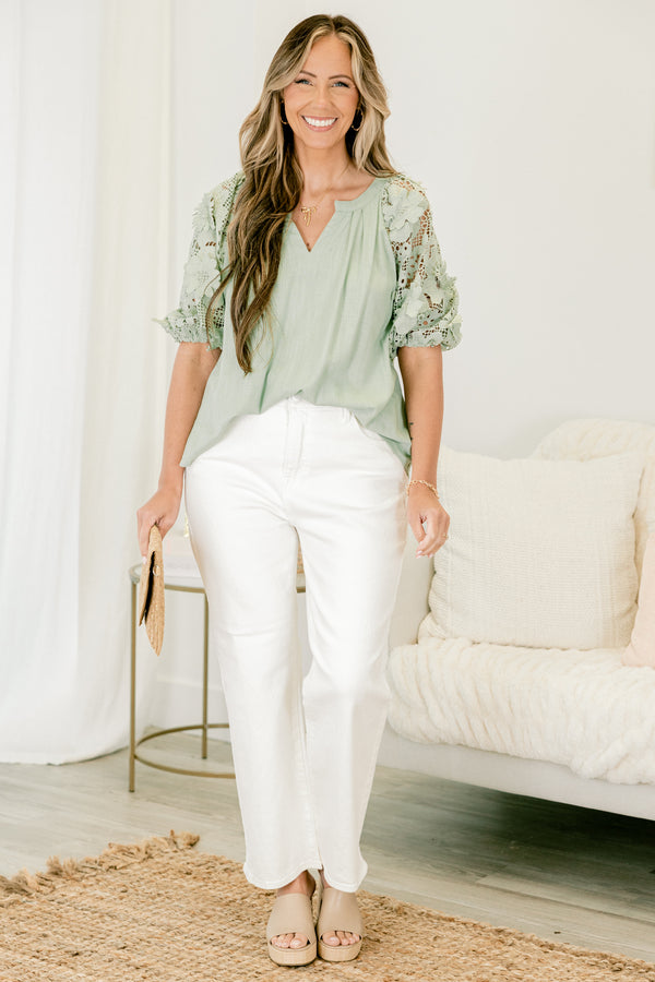 Chic Soul Plus size clothing, White jeans with front pockets and a slight flare at the end of each pant leg 
