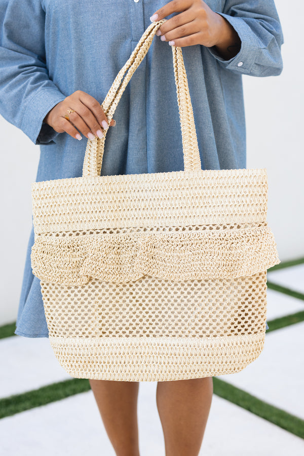 Chic Soul plus size clothing, beige woven bag with straps as well as a ruffle flap going around the top middle of the bag 