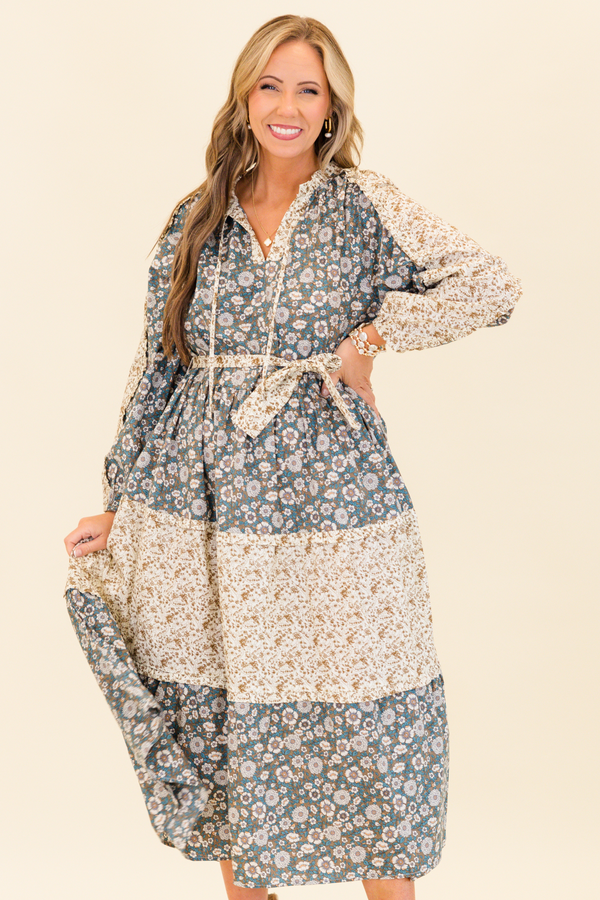 Chic Soul plus size clothing, long-sleeve olive multi-colored maxi dress with v-neckline and tassels with waist-tie and subtle ruffles with different floral patchwork along the dress