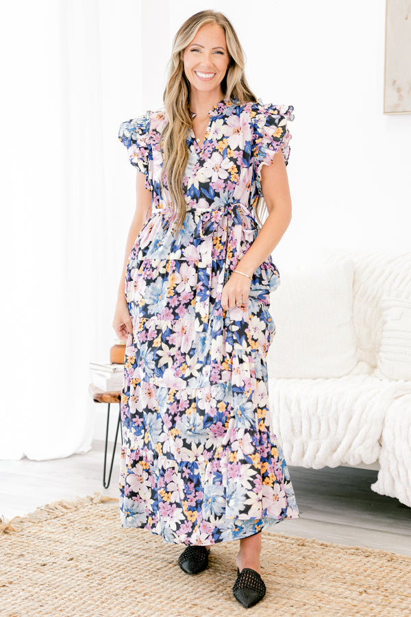 Plus Size navy floral tiered maxi dress with flutter sleeves, a split v-neck, and a waist sash.