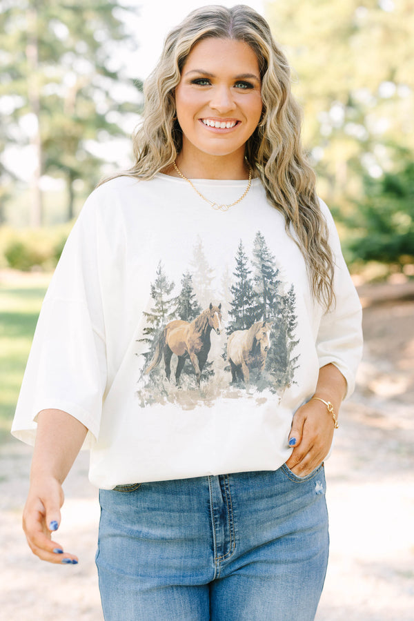 Plus Size ivory boyfriend tee in 100% cotton with a vintage horse and forest graphic.