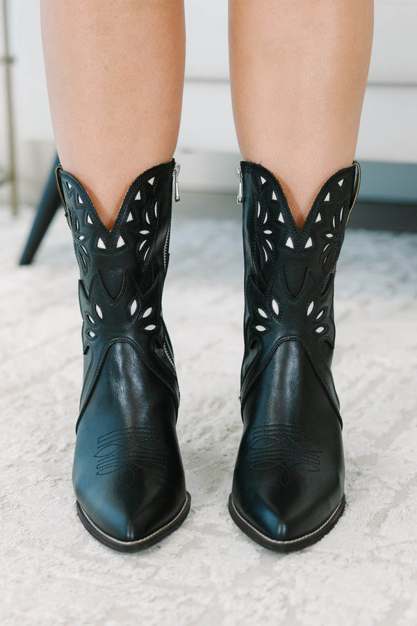 Plus size black western booties with white cutout details, red piping, and a stacked block heel.