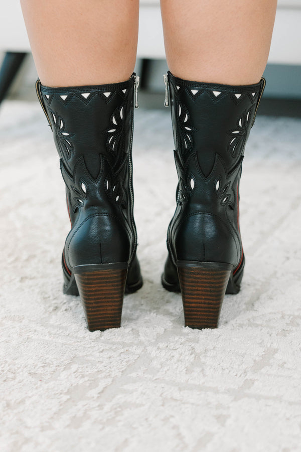 Plus size black western booties with white cutout details, red piping, and a stacked block heel.