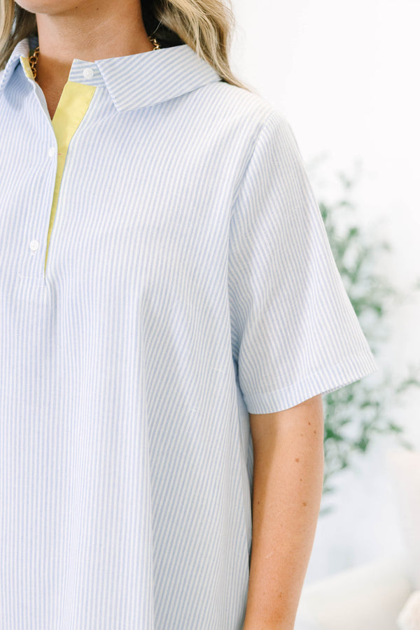 Plus Size blue and white striped midi dress with short sleeves, a collared neckline, and ruffle hem.