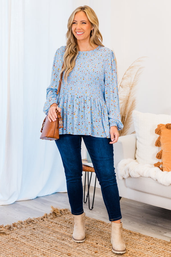 Chic Soul plus size clothing, light blue long sleeve top with smocked chest and small floral design