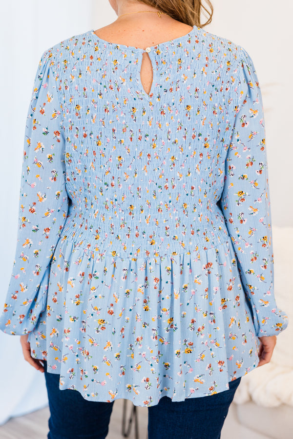 Chic Soul plus size clothing, light blue long sleeve top with smocked chest and small floral design