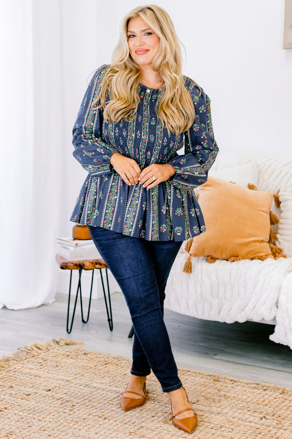 Chic Soul plus size clothing, navy blue long sleeve babydoll top with green, pink, and red floral pattern and cinched top