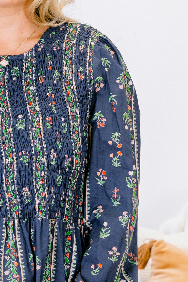 Chic Soul plus size clothing, navy blue long sleeve babydoll top with green, pink, and red floral pattern and cinched top