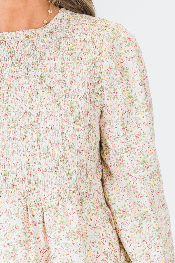 Chic Soul plus size clothing, long-sleeve high-scoop-neckline white baby doll top with a smocked bodice and a small floral print pattern