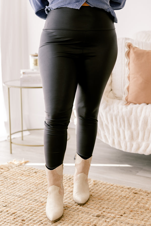 Chic Soul plus size clothing pair of black faux leather leggings with a sleek, shiny finish
