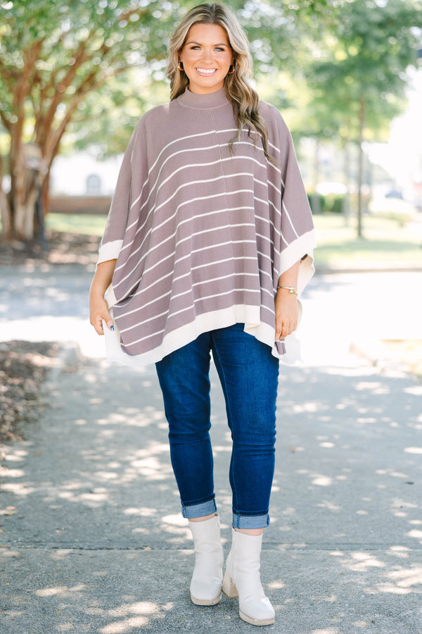 Plus Size brown and white striped knit poncho with a mock neckline and wide sleeves.