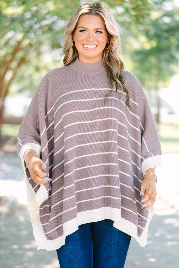 Plus Size brown and white striped knit poncho with a mock neckline and wide sleeves.