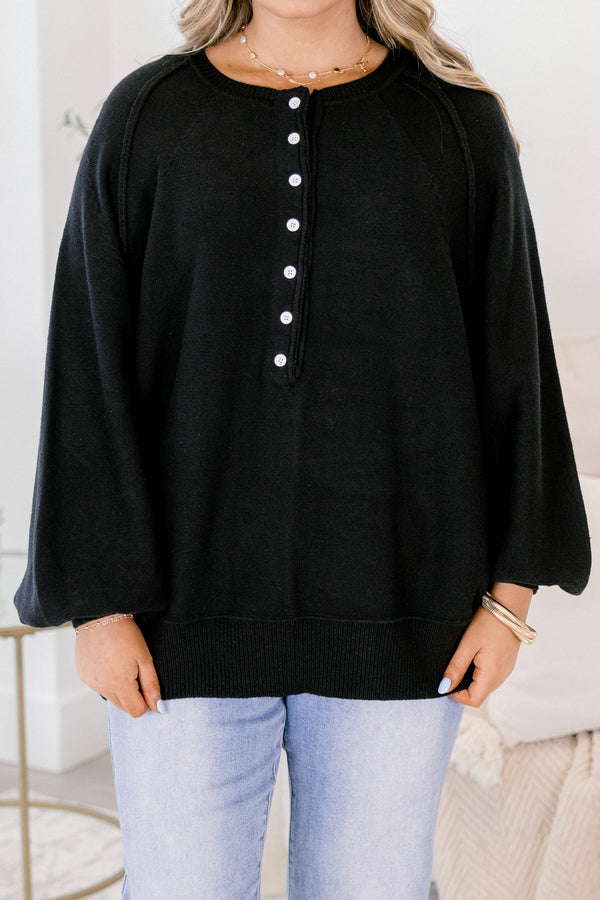 Chic Soul plus size clothing, black sweater with long bubble sleeves and white buttons going down to the chest area 