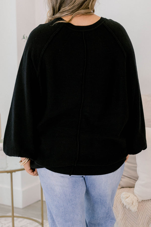 Chic Soul plus size clothing, black sweater with long bubble sleeves and white buttons going down to the chest area 