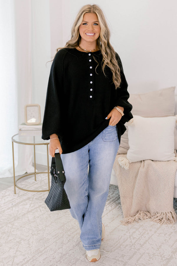 Chic Soul plus size clothing, black sweater with long bubble sleeves and white buttons going down to the chest area 
