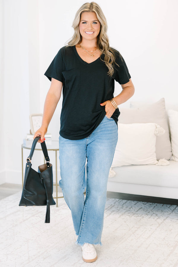 Plus Size black v-neck top with a relaxed fit, short sleeves, and a functional front chest pocket.